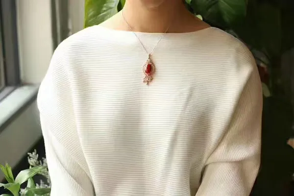 Nanhong Agate Pendant — worn